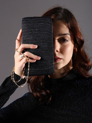 Elegant black textured clutch bag with golden chain for women by Ensac