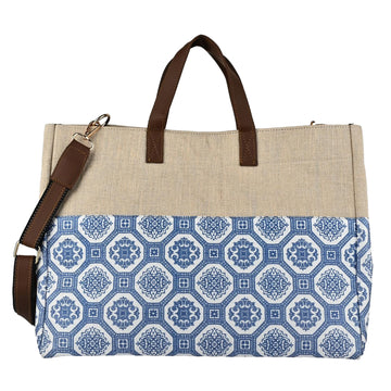 Beige tote bag with brown handles and strap, featuring a blue and white patterned flap on a white background by ENSAC