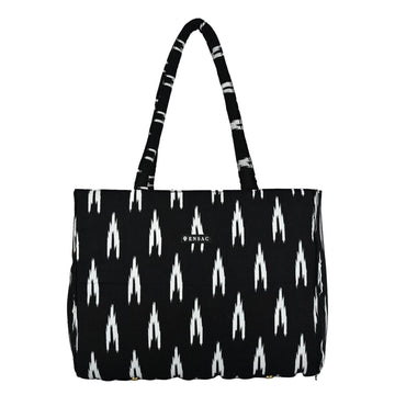 Black tote bag with white pattern and 'PENSAQ' branding on a white background BY ENSAC