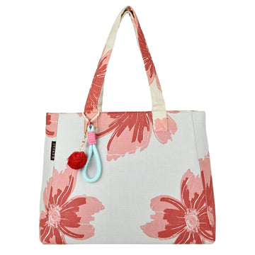 Floral tote bag with a pom-pom charm on a white background by ENSAC
