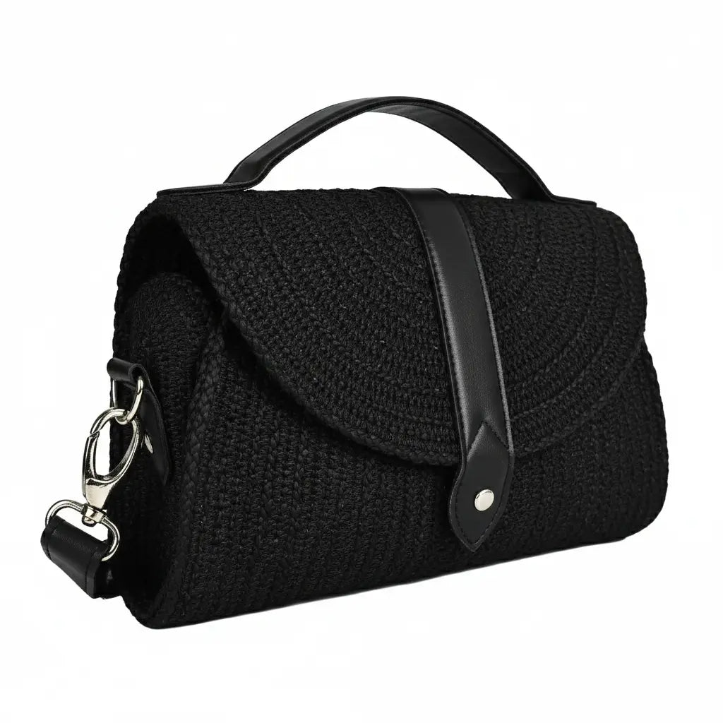 Black textured handbag with leather accents on a white background by ENSAC
