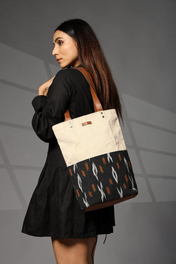 Black and beige ikkat jute tote bag with brown straps for women by Ensac